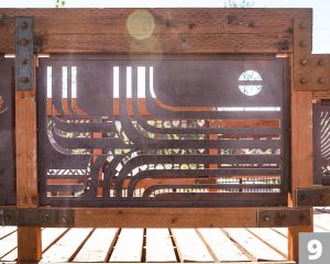 A Corten steel panel laser cut with a design for the Three Creeks Confluence Park